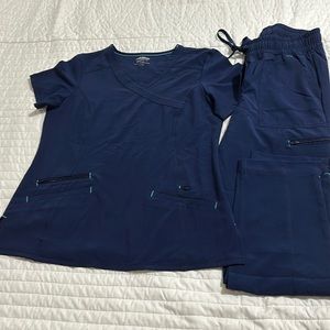 Navy blue scrubs by Scrubstar performance. EUC
